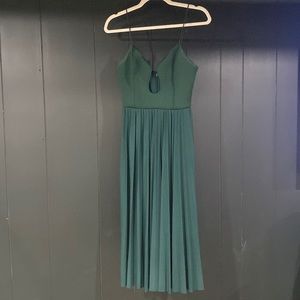 Dark green midi dress with cut out